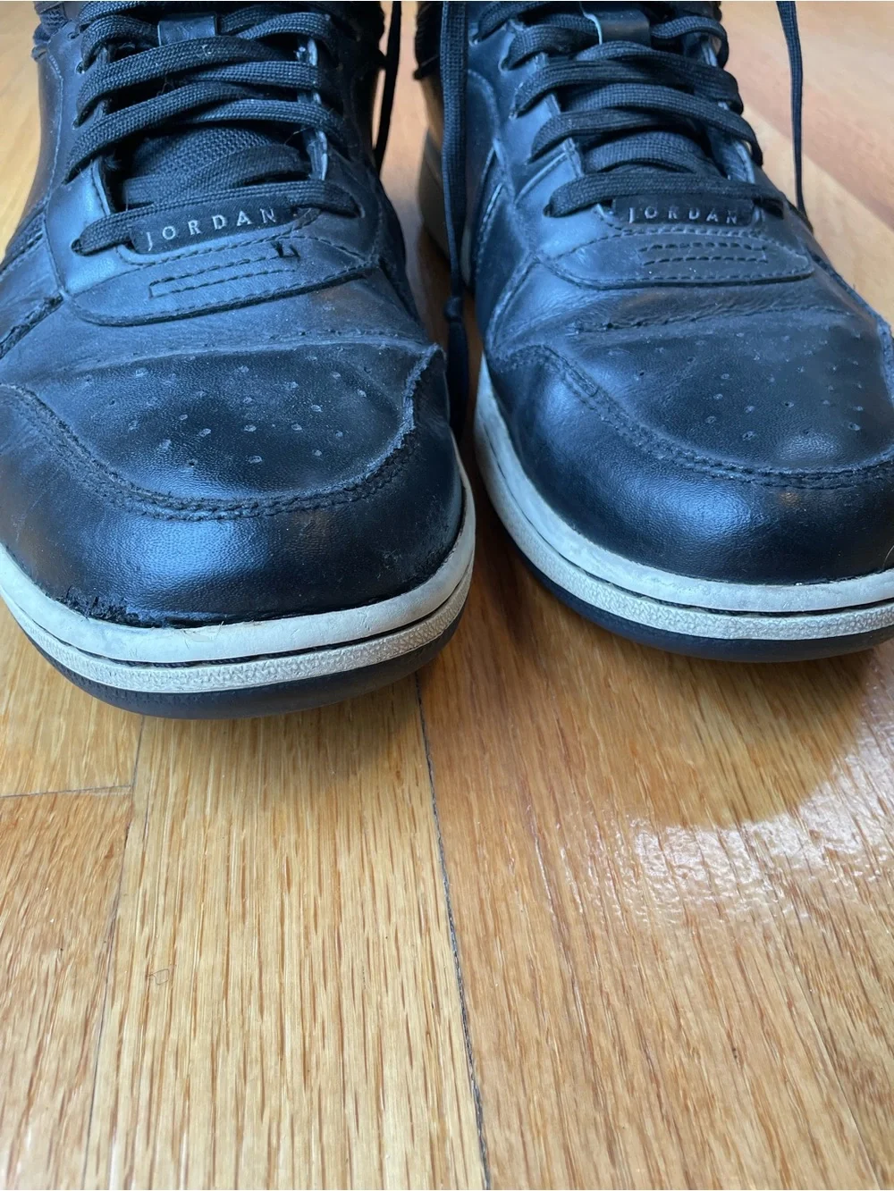 Men’s Size 12 Jordan Heritage Black and White High-Top Sneakers